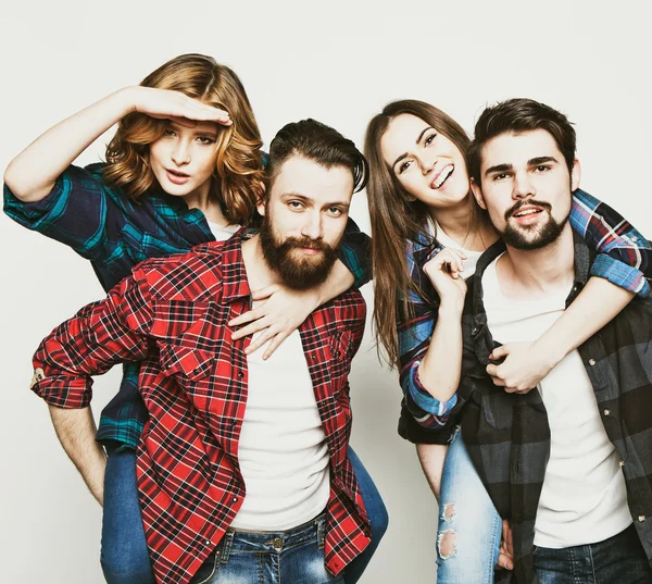 Group of happy young men and women — Stock Photo, Image