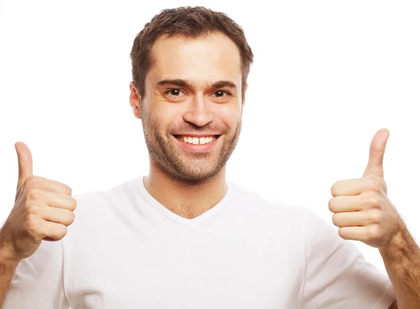 Happy handsome man showing thumbs up — Stock Photo, Image