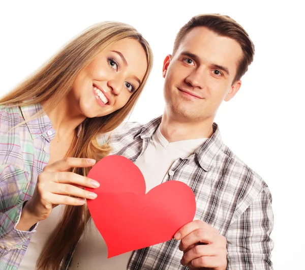Happy couple in love holding red heart — Stock Photo, Image