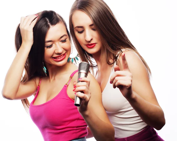Sensual girls singing with microphone — Stock Photo, Image