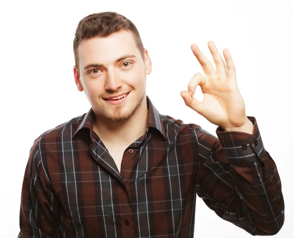 Handsome young man in shirt looking at camera — Stock Photo, Image