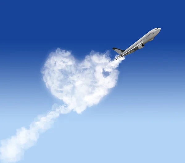 Heart shape cloud and plane — Stock Photo, Image