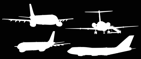 Cuatro siluetas de aviones — Vector de stock