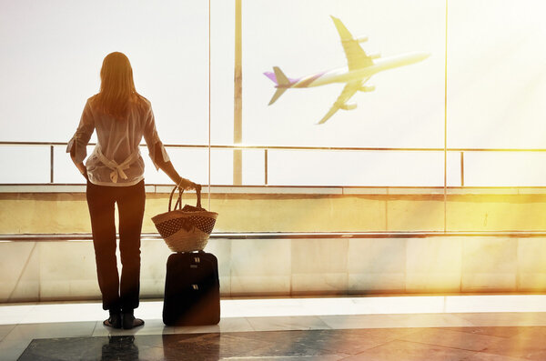 Girl at the airport window