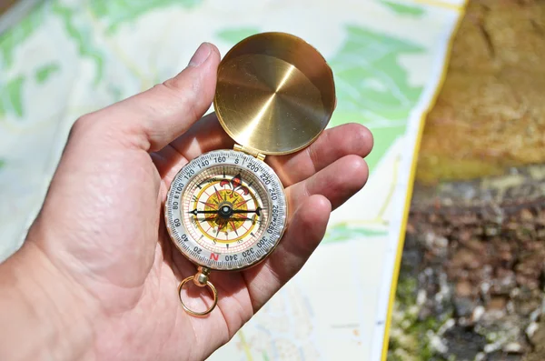 Compass in the hand — Stock Photo, Image