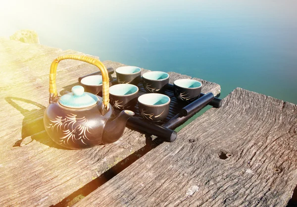 Chinese tea set on a wooden jetty — Stock Photo, Image