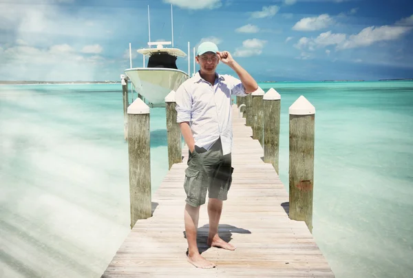 Man on jetty in Bahamas — Stock Photo, Image
