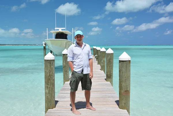 Man on jetty in Bahamas — Stock Photo, Image