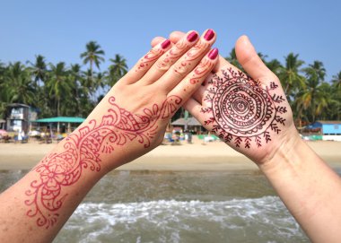 Henna tattoo on the hands. clipart