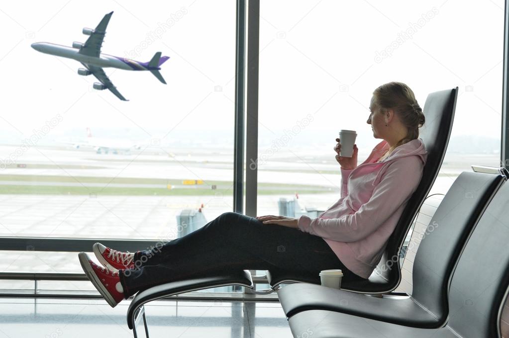 Girl at airport window