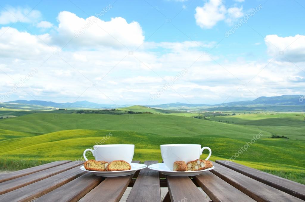 Two coffee cups and cantuccini