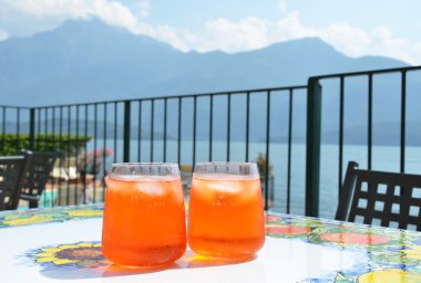 Italian Spritz cocktail in lake Como clipart