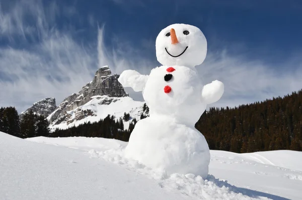 Bonhomme de neige contre les Alpes suisses — Photo