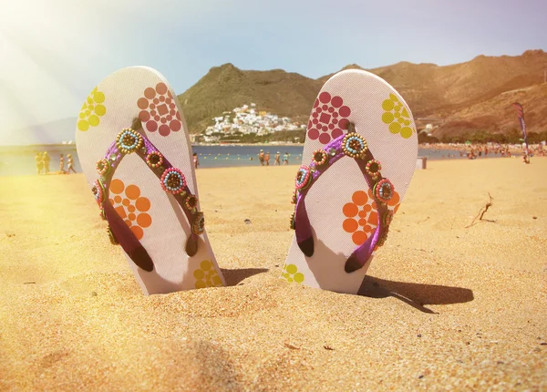 Flip-flops in  sand of Teresitas beach. — Stock Photo, Image