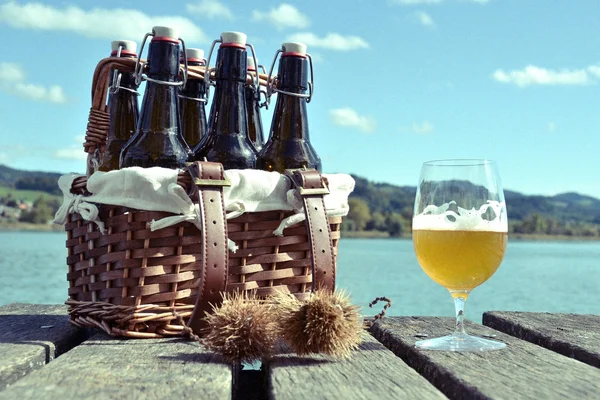 Beer on the wooden jetty — Stock Photo, Image