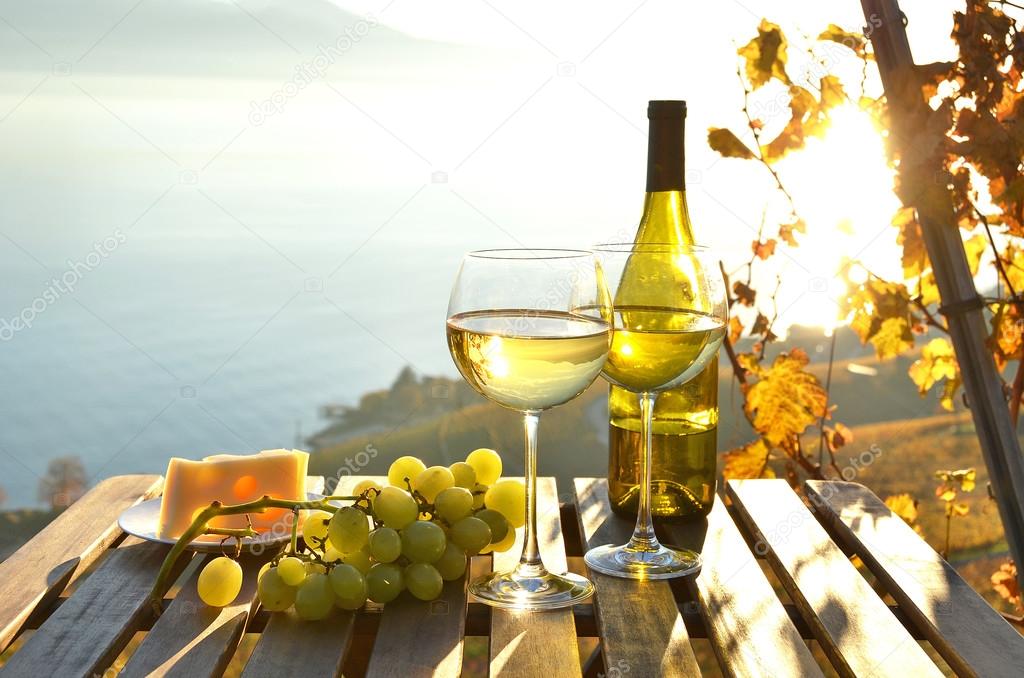 Wine and cheese against Geneva lake
