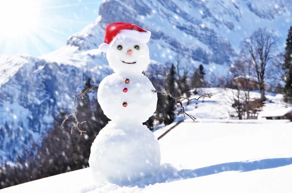 Snowman against Alpine panorama — Stock Photo, Image