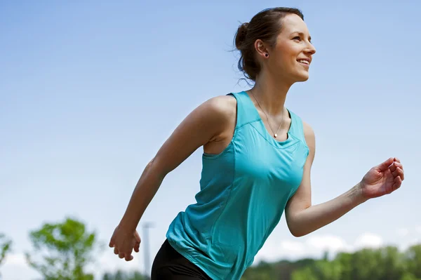 Fit woman jogging in park. — Stock Photo, Image