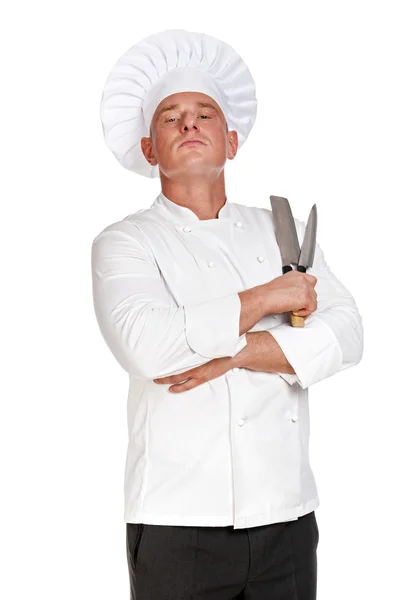 Proud chef man holding two knifes. — Stock Photo, Image