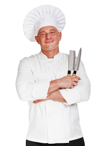 Chef hombre sosteniendo dos cuchillos . — Foto de Stock