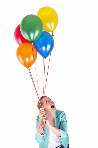 Woman with balloons over white background smiling Stock Image