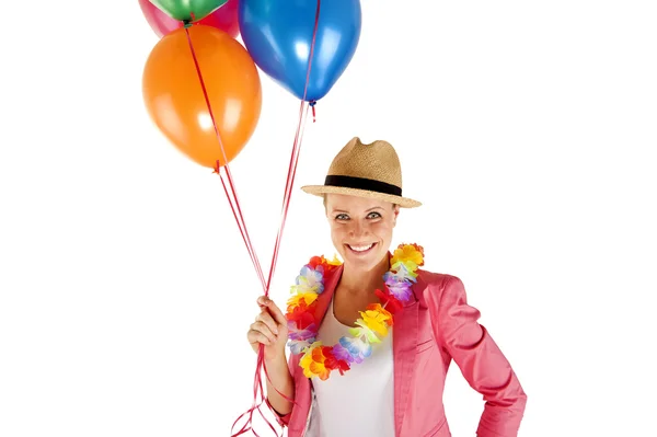 Mujer con globos sobre fondo blanco sonriendo — Foto de Stock