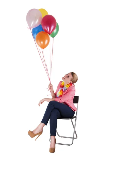 Mulher com balões sobre fundo branco sorrindo — Fotografia de Stock