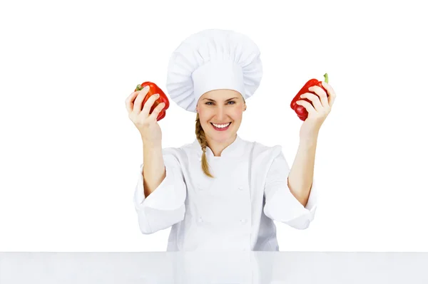 Chef woman. Isolated over white background by the table with pap — Stock Photo, Image