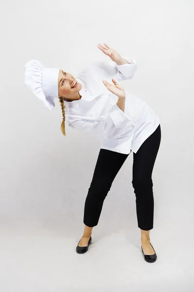 Joven chef profesional mujer. Aislado sobre fondo blanco — Foto de Stock