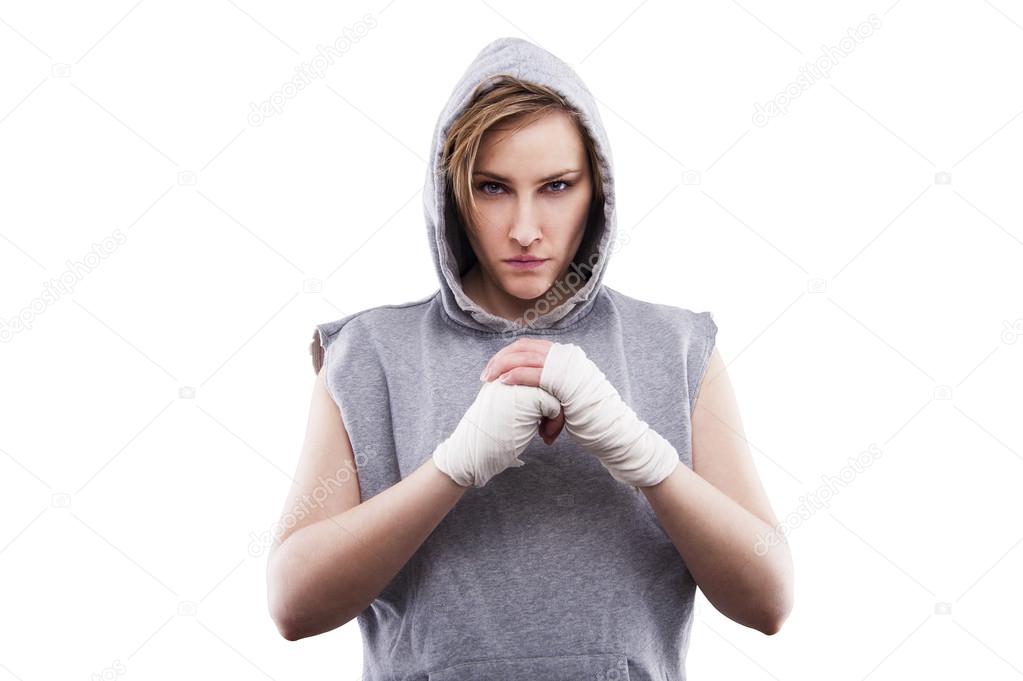 female MMA fighter in a black background