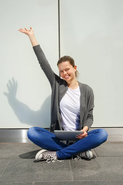 Young woman using tablet leaning to wall, very happy emotions — Stock Photo, Image