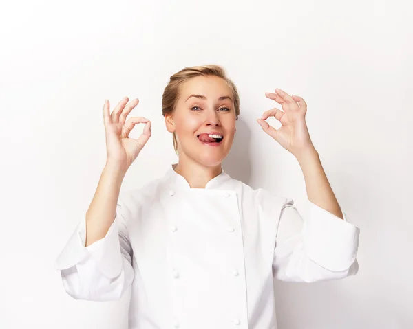 Woman chef showing sign perfect both hands over whita background — Stock Photo, Image