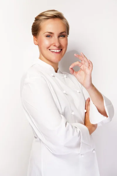 Woman chef showing sign perfect hand, over whita background smil — Stock Photo, Image