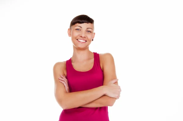 Mladá žena v fitness oblečení isoleted nad bílým pozadím smi — Stock fotografie