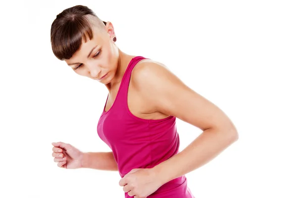 Young running woman in fitness outfit, running to aside. Isolate — Stock Photo, Image