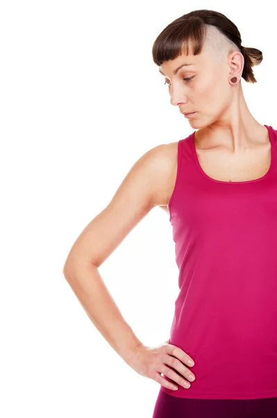 Joven mujer de fitness mirando a un lado. aislado sobre fondo blanco — Foto de Stock