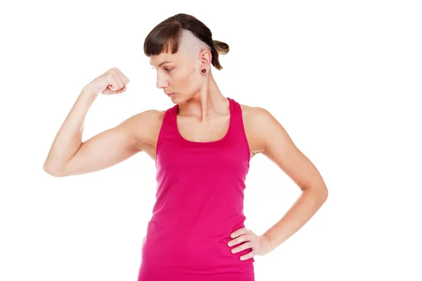 Fitness mladá žena, ukazující musculs zbraně. Izolované nad bílé ba — Stock fotografie