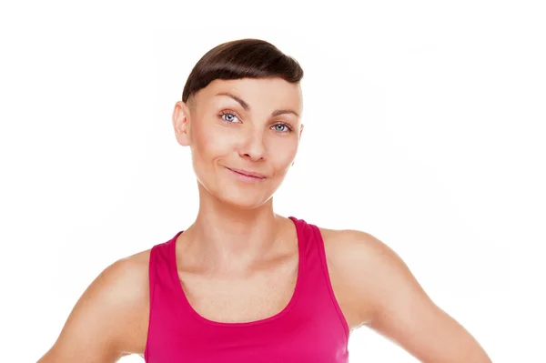 Portret van fitness vrouw geïsoleerd op witte achtergrond. Smilin — Stockfoto