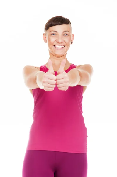 Portriat fitness ženy s palec nahoru. Izolované nad bílé ba — Stock fotografie