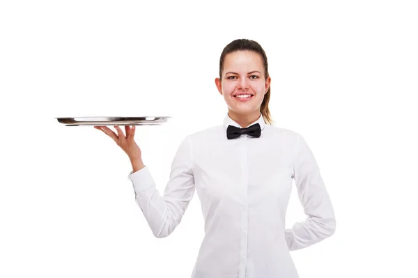 Jovem mulher no garçom uniforme segurando bandeja isolado sobre branco b — Fotografia de Stock