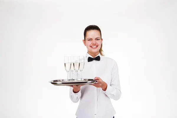Žena v číšník jednotné, zásobník a naléval šampaňské, — Stock fotografie