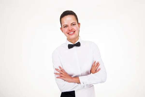 Young woman in waiter uniform isolated over white background. — Stock Photo, Image