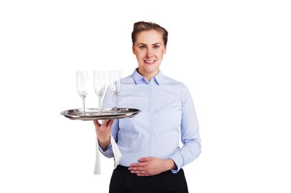 Kvinna i servitör uniform holding bricka med glasögon, leende, isol — Stockfoto