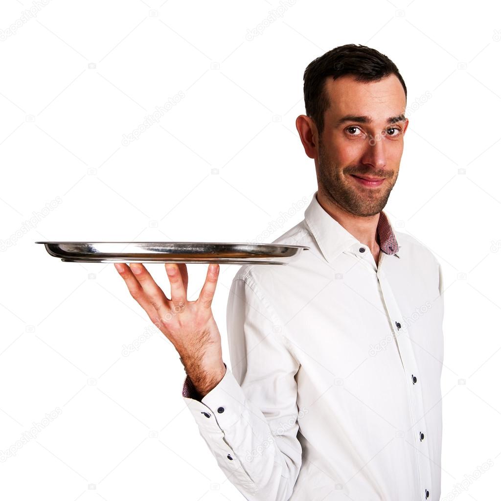 Waiter holding tray with smile, isolated over white background.