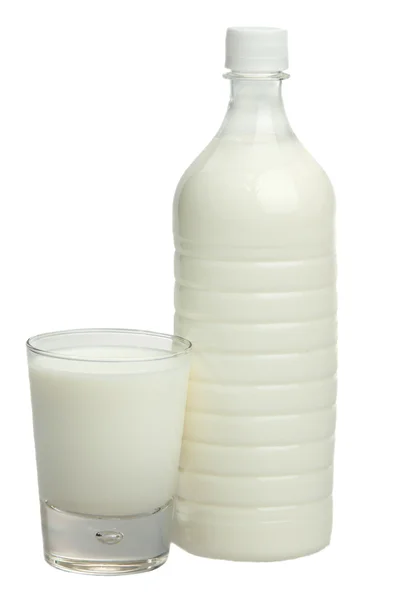 Milk in a bottle on a white background, isolated. — Stock Photo, Image