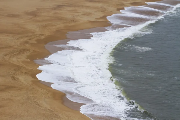 Strand Zand Stockafbeelding