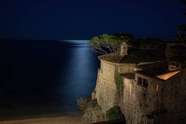 Night scene , long exposure picture from a traditional building in Spanish Costa Brava, village Calella de Palafrugell clipart