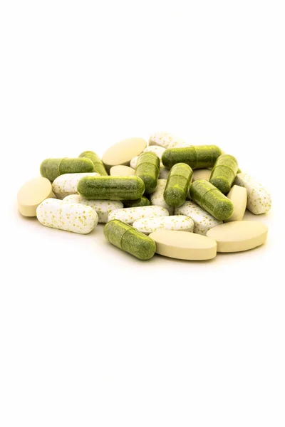 Green chlorophyll capsules — Stock Photo, Image