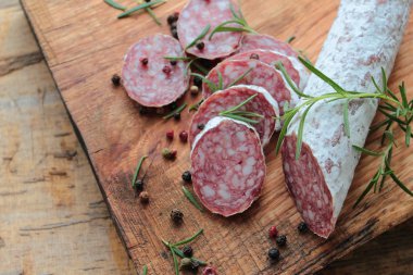 Salami with herbs clipart