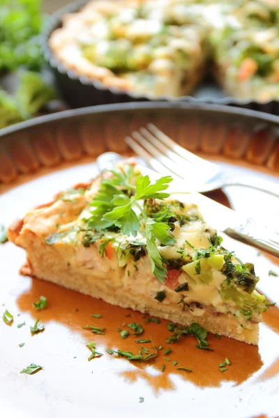 Piece of vegetable pie with broccoli — Stock Photo, Image